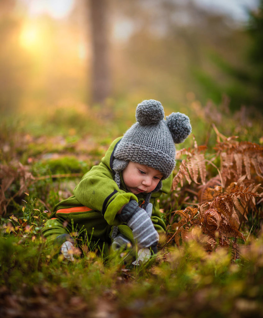 autumn baby on kid-friendly environmental eco lawn